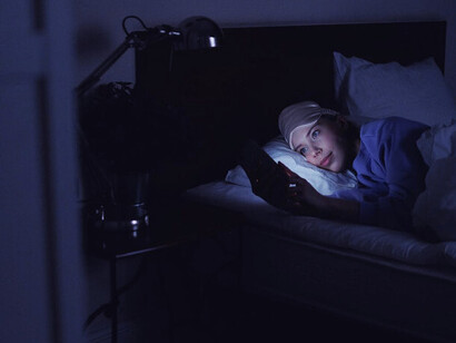 With furrowed brows and a trembling hand, she types desperately, wishing for the familiar warmth of Rowan's support to return