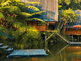 The calm and serene atmosphere of Dusun Bambu in Bandung, Indonesia, offers the perfect setting to relax in a gazebo, letting the gentle breeze and vibrant greenery soothe your senses