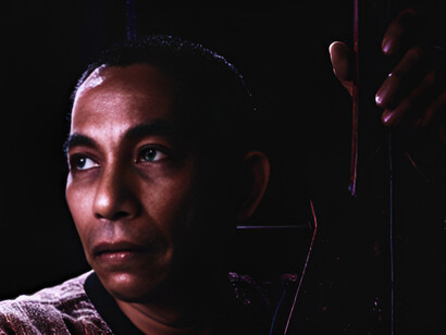 Joey Ayala holds a traditional Filipino instrument close, symbolising his dedication to preserving and promoting the cultural heritage of Mindanao through his music
