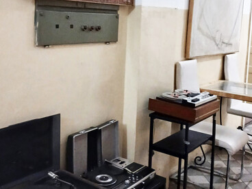 Image of the rooms inside the Discom office in Belgrade, Serbia, along with a display of products available for direct sale