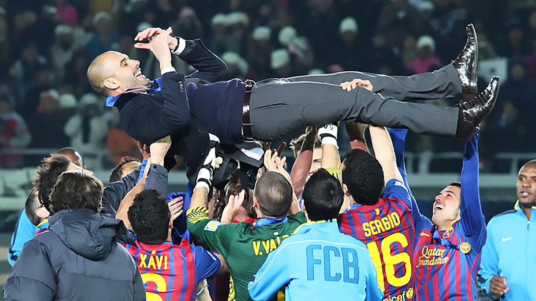 FC Barcelona's 2011 Team of the Year celebrates with Pep Guardiola lifted in the air