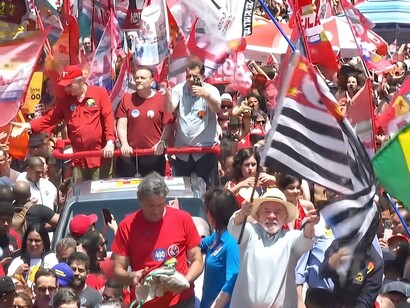 Supporters wearing the red colours of the Workers’ Party join Luiz Inácio Lula da Silva at his closing campaign rally in São Paulo, Brazil