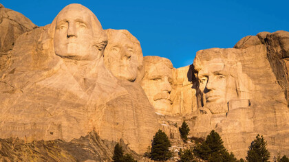 Mount Rushmore, Black Hills region of South Dakota, USA features George Washington, Thomas Jefferson, Theodore Roosevelt and Abraham Lincoln