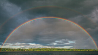 Full rainbow brings light and symbolizes hope in post-pandemic times