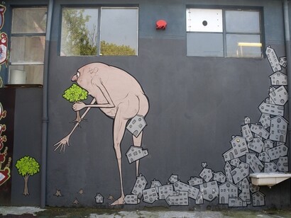 *Cagacemento*, 2010, spray e pennello su muro, Milano