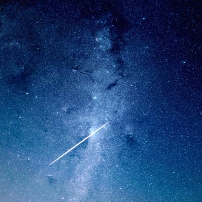 Earth and all whirl around the center of our galaxy at 220 kilometers per second or 490,000 miles per hour