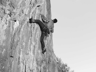 Like this climber scaling a challenging rock face, Roberto Espeche demonstrated remarkable perseverance in overcoming adversity