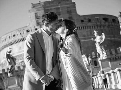 Capturing the essence of Romantic kiss on the Castle Sant’Angelo Bridge