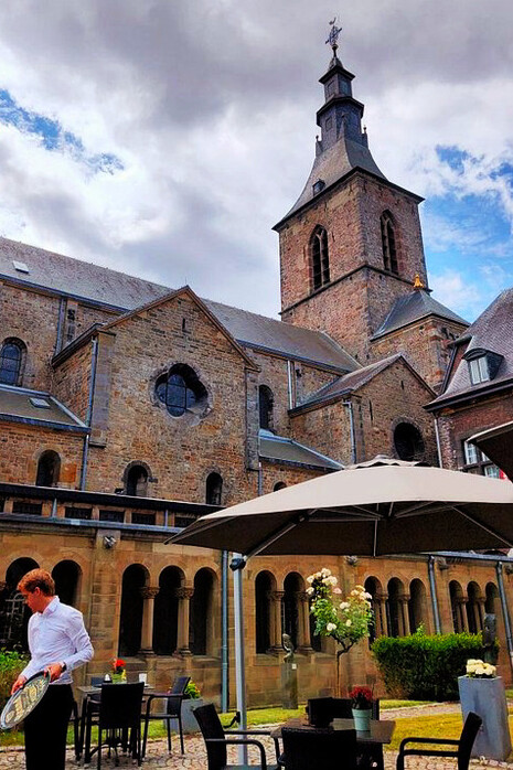Steeped in 900 years of history, Hotel Rolduc stands as a magnificent testament to Kerkrade's rich architectural heritage in the Netherlands, inviting visitors to explore its timeless charm
