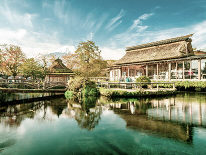 The majestic Mount Fuji overlooking the serene Oshino Hakkai in Japan