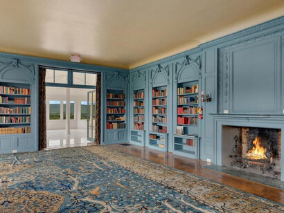 Its interior architecture is characterized by opulent detailing, such as ornate plasterwork and wood-burning fireplaces. Photo by © Tricia McCormack