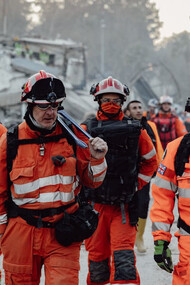 Amid the devastation of a collapsed city, rescue teams rely on advanced robots to navigate the treacherous rubble and locate survivors, ensuring safety and efficiency in their mission