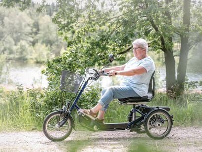 PFMobility brand electric tricycle. The Danish manufacturer offers parallel tandem bicycles classified as a therapeutic resource