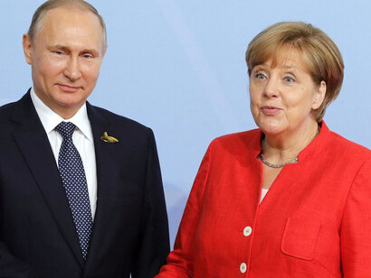 Putin y Merkel