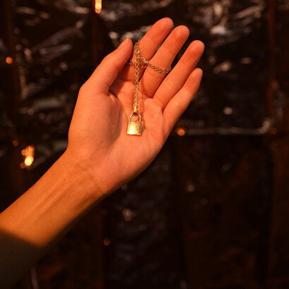 Corrente e pingente de cadeado