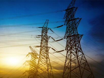 Electricity pylons supporting continuous power delivery, symbolising the scale of investment required for future digital growth