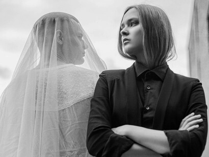 A veil keeps the couple from truly being together; the magical or dishonest way of denying what is happening