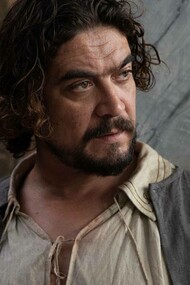 The lead actor, Riccardo Scarmarcio, in a scene from Caravaggio's Shadow (2022)