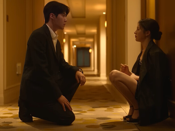 Ho-jin kneeling beside Mu-hee during one of her lowest moments, representing the true meaning of showing up when love is tested