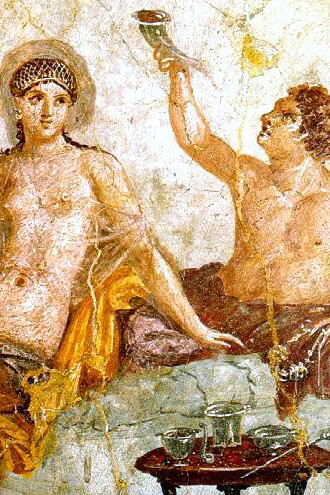 A wall painting depicts an idealised Greek drinking party, where a man drinks from a rhyton, a vessel with two openings, while his female companion, dressed in a sheer garment and a golden hair net, sits beside him as a servant offers a small box, with a table in front displaying silver vessels used for mixing wine