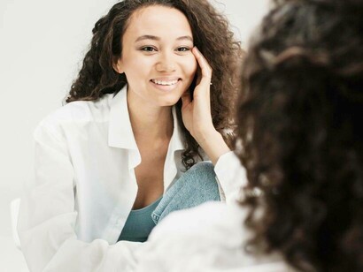 A woman visualizing and revealing who she intends to be which is enabling her to self-love