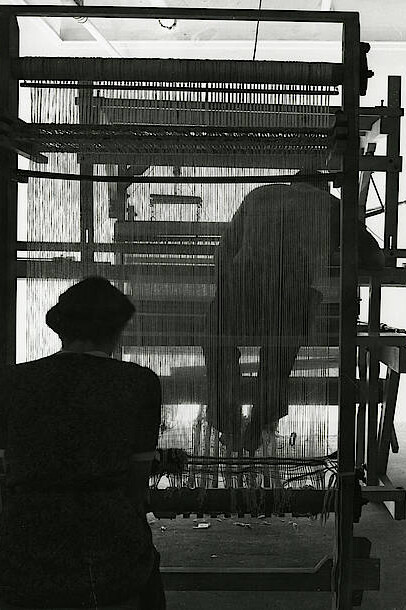 Two students weaving on a rug loom n.d. Photo by John Stix. Courtesy Western Regional Archives, State Archives of North Carolina, Asheville, NC.