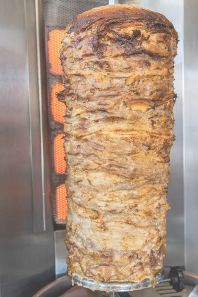 Doner kebab spit in a fast food restaurant, showcasing Germany's popular street food
