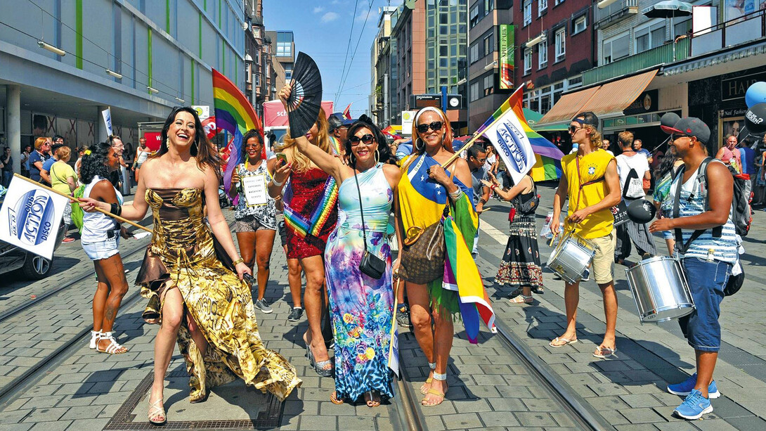 Women and drummers celebrating Christopher Street Day in Berlin