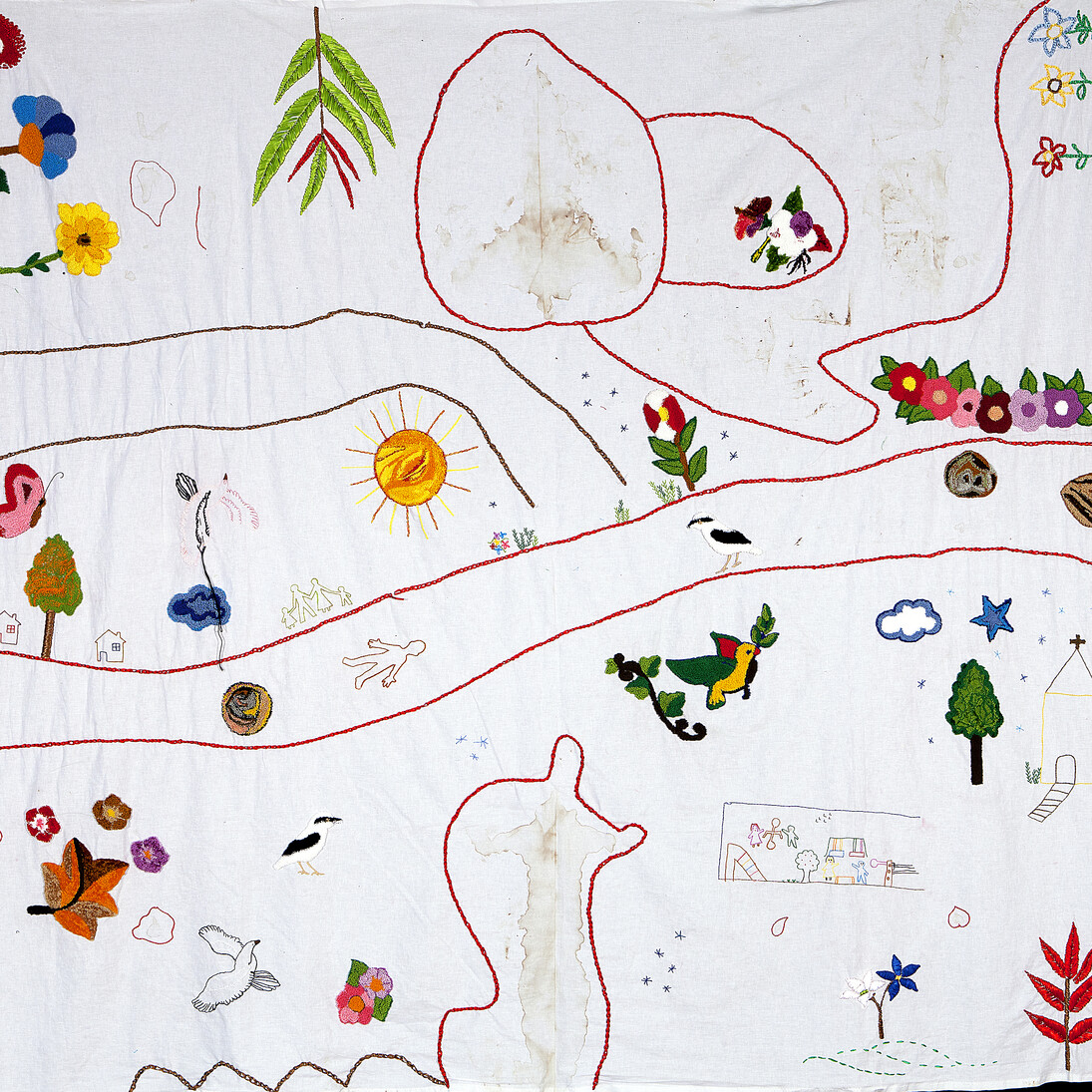 Gerlaine GG Om Pào Com Molho: Identidade desconhecida / Gerlaine GG Om Pào Com Molho: Unknown Identities, 2014
Embroidery on fabric previously imbued with blood from the body of a woman assassinated in Recife, Brazil. Created by women from the Social Center Dom João Costa: Marluce Pedro de Araujo, Maria Gracas Guimares de Lima, Edinai Maria da Silva, Ezilda Rodrigues da
Silva, Josefa Helena da Silva, Josilene Maria da Silva, Zumeira Deca da Silva, Rositania da Silva Santos, and Jocileide Benedita de Souza.
89 x 96 inches