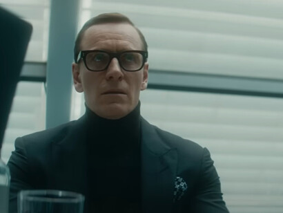Michael Fassbender plays George, a man of sharp precision and cool detachment, a spy who masks emotion with efficiency but whose deepest loyalty lies not with his mission, but with his wife