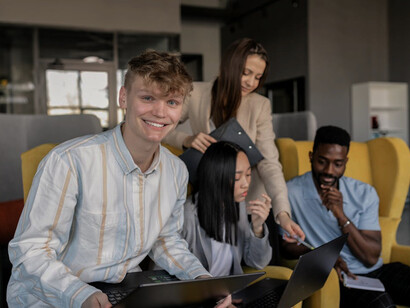 A team celebrating a milestone achievement, radiating with confidence and pride as they shatter the limitations of imposter syndrome, fueled by their collective support and recognition