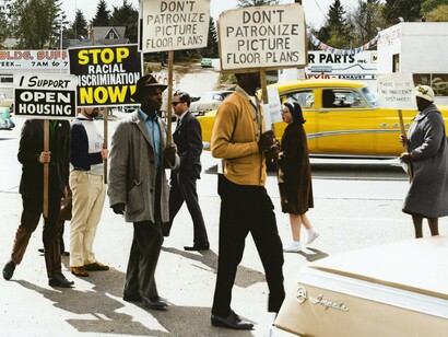 A CORE-sponsored demonstration at the Picture Floor Plans, Inc. realtor office in Seattle, Washington, captured in this original black-and-white negative by the Seattle Police Department on May 4, 1964, US