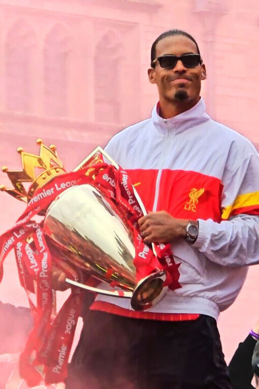 Virgil van Dijk with the Premier League trophy at the Liverpool's trophy parade after winning the league
