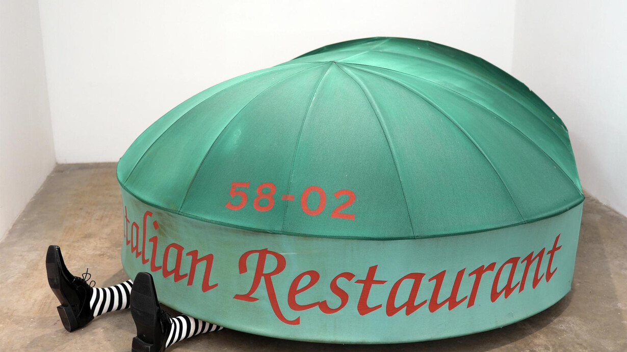Eirc Mistretta, Happy, Healthy, You and Yours, 2015, awning, shoes, socks, resin, dimensions variable. Courtesy Scaramouche, New York
