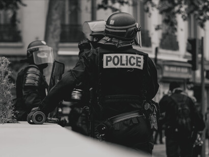 Policemen wearing protective gear