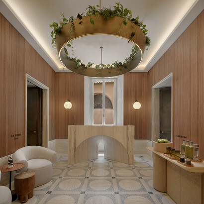 The spa entrance at Six Senses Rome, where hotel guests go to relax in the water, steam, and beautiful stone