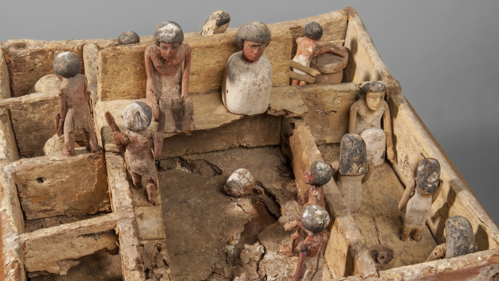 Egyptian (found in Mastaba B, South Pyramid, Al Lisht)
Model of Estate Workshops: Granary, Bakery, and Weaver's Shop
Middle Kingdom, 12th Dynasty, 1991–1782 BC
Wood, paint
L. 19.5 in. (49.5 cm), W. 19 1/16 in. (48.5 cm), H. of walls, 3 ½–4 3/8 in. (9–11 cm)
Sidney and Lois Eskenazi Museum of Art, William Lowe Bryan Memorial