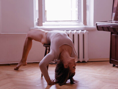 Dancing alone in the quiet of her home, she reveals the uninhibited essence of her true self, free from judgment and pretense