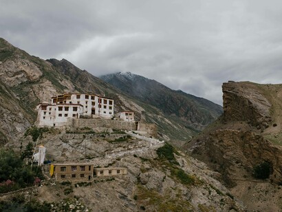 Ancient Tibetan monastery on a mountain slope in Tibet, Nepal