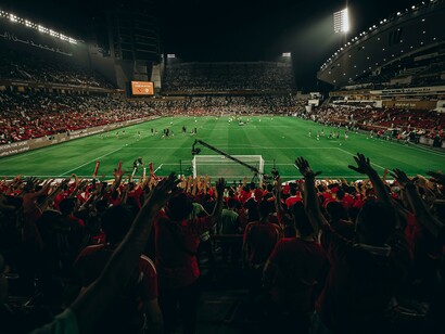 Thrilling football game unfolding in Abu Dhabi’s stadium, United Arab Emirates