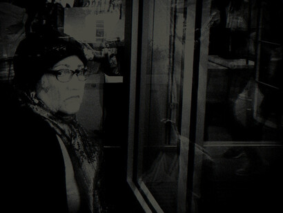 Behind the Glass Wall. Courtesy of Soho Photo Gallery