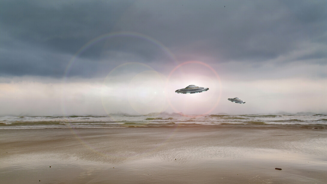 Captivating UFO sighting unfolds on a deserted beach, sparking intrigue and mystery