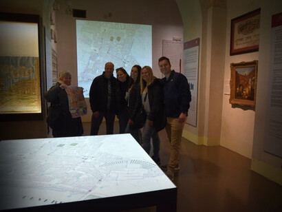 Licensed tour guide from the community  Daniela A. providing detailed insights of the former Ghetto to her private clients. Room 2 in the Jewish Museum of Rome