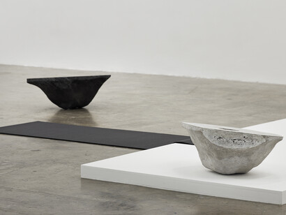Chris Evans, Clerk of Mind, Detail of CLODS, Diplomatic Letters showing CLOD III (dark) and CLOD II (light), 2012. Concrete, marble, pvc mat, painted wooden platform. Dimensions variable. Project Arts Centre, Dublin (2014)