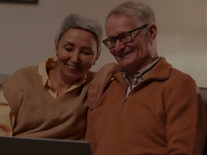 An elderly couple in their home in Europe