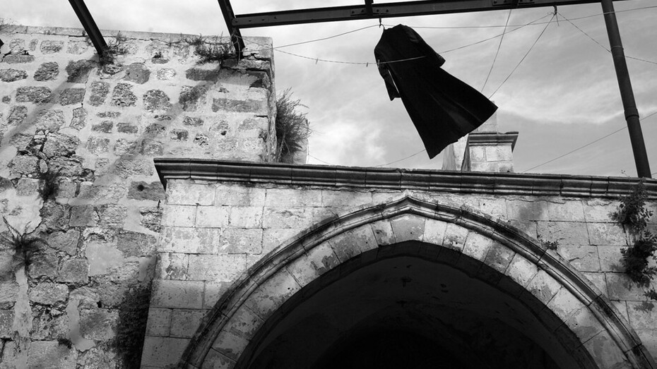 Kathryn Cook, A priest's frock hands out at an Armenian abbey in Jerusalem.