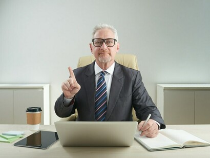 Senior professional in the workplace, baby boomers' contributions at work, and balancing career and personal life