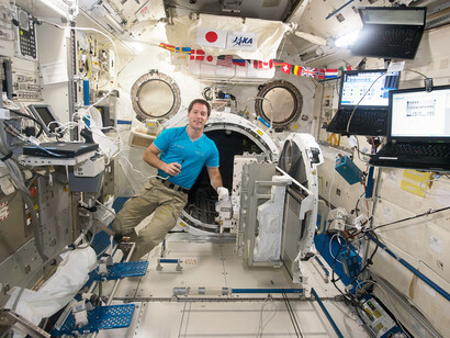 European Space Agency astronaut Thomas Pesquet floats near the airlock inside the Japanese Experiment Module aboard the International Space Station. The airlock is used to transfer experiments, small satellites, and other technological payloads from the station’s interior into the vacuum of space
