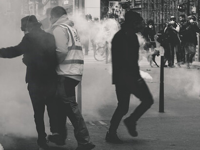 Amidst the 25th weekend of Yellow Vest protests in the streets of Lyon, France, police respond with tear gas as they clash with demonstrators