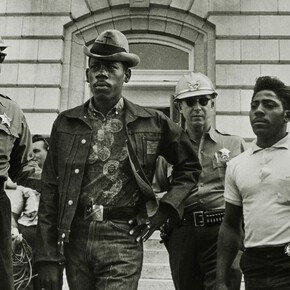 Danny Lyon (American, born 1942), Sheriff Jim Clark arrests two SNCC voter registration workers on the steps of the federal building, Selma, Alabama, 1963, printed later, Gelatin silver print, h. 11 in. (27.9 cm); w. 14 in. (35.6 cm), San Antonio Museum of Art, gift of Ernest Pomerantz and Marie Brenner, 2017.25.42, © Danny Lyon / Magnum Photos